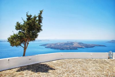 Scenic view of sea against clear blue sky