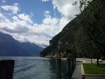 Scenic view of calm lake against mountain range