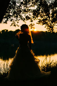 Woman looking at sunset