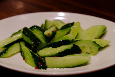 Close-up of zucchini served in plate on table