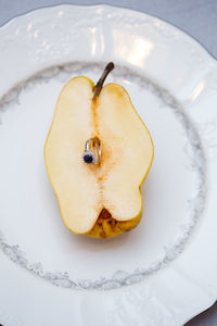 High angle view of fruit in plate on table