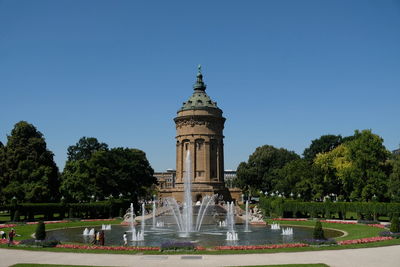 Mannheimer wasserturm, a 60m sandstone water tower and city square landmark decorated in sculptures