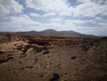 Scenic view of desert against sky