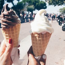 Midsection of woman holding ice cream