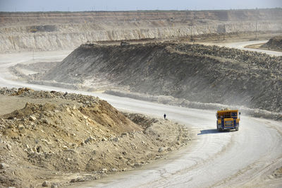 Dump truck moving at quarry