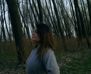 Young woman in forest