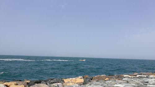 Scenic view of sea against clear sky