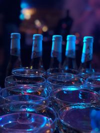 Close-up of wine glasses on table