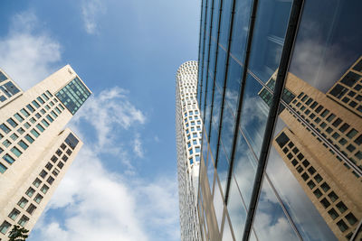 Low angle view of skyscrapers against sky