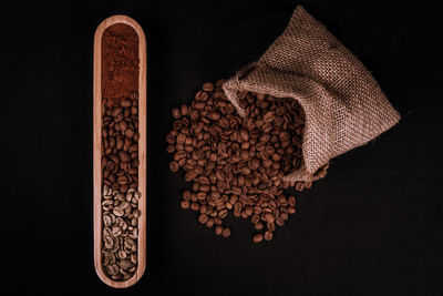 High angle view of coffee on table against black background