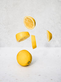 High angle view of fruits on white table