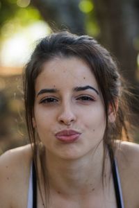 Close-up portrait of young woman