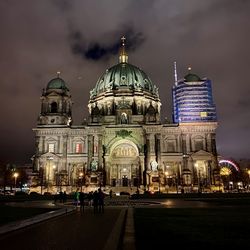 View of illuminated building against sky at night