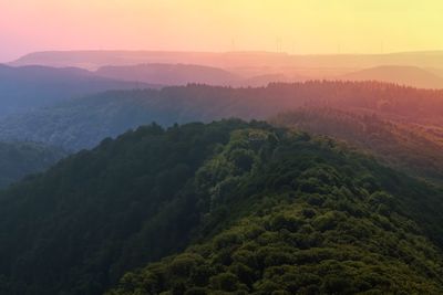 Scenic view of mountains against sky during sunset