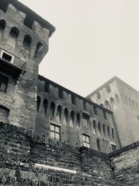 Low angle view of old building against sky