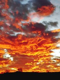 Scenic view of dramatic sky during sunset