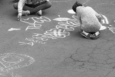 Children drawing on street