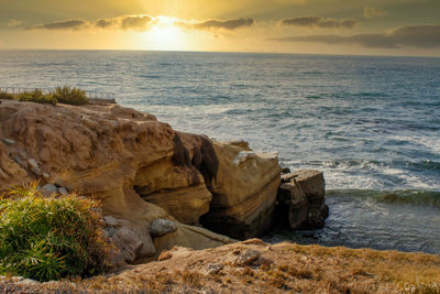 Scenic view of sea against sky during sunset