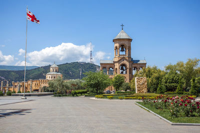 View of mosque against sky in city