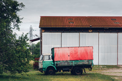 Abandoned car on field