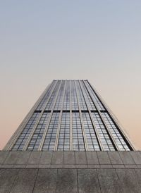 Low angle view of modern building against clear sky