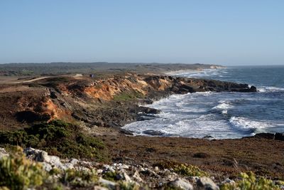 Scenic view of sea against clear sky