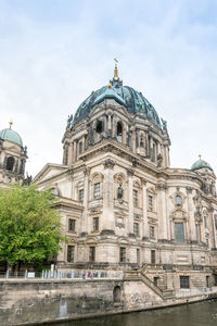 Low angle view of berlin cathedral against sky