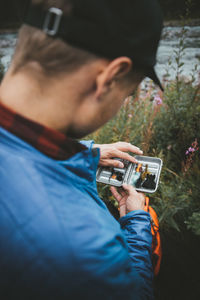 Portrait of man photographing