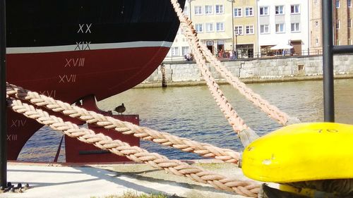 Boats moored at harbor