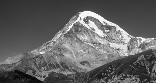 Scenic view of snowcapped mountain against sky