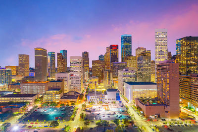 Buildings in city against sky