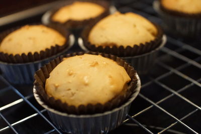 Close-up of cupcakes on barbecue grill