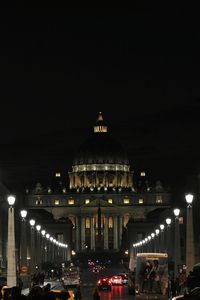 Facade of illuminated building at night