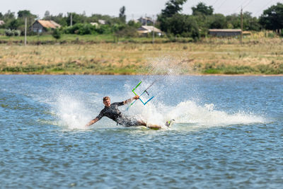 Man surfing in water