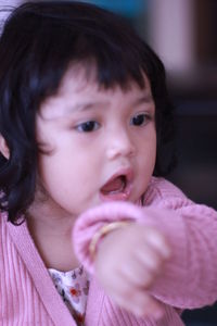 Portrait of cute girl looking away