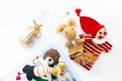 High angle view of christmas decorations against white background