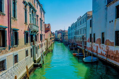 Grand canal amidst buildings