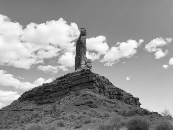 Black and white landscape of one large thin vertical rock monolith