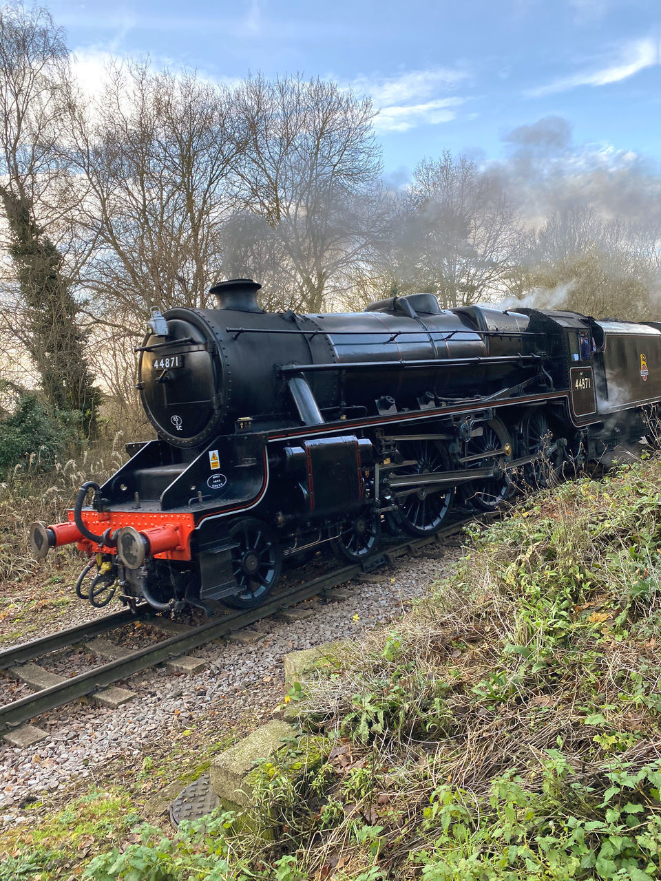 TRAIN ON RAILROAD TRACK