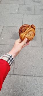 Low section of person holding food