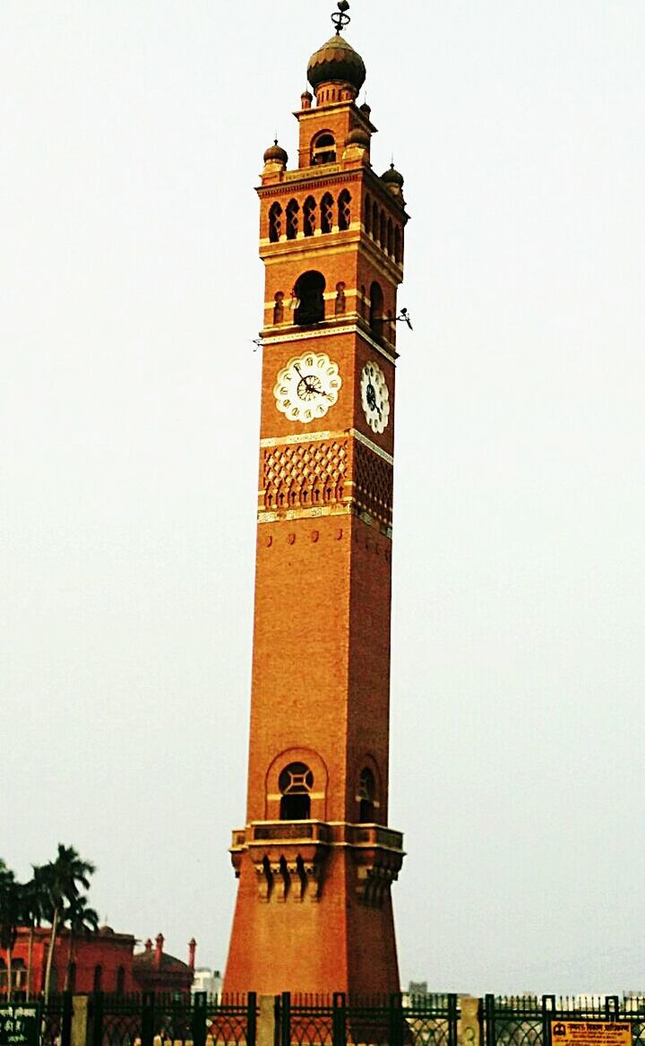 architecture, built structure, building exterior, clock tower, tower, low angle view, clear sky, clock, tall - high, time, copy space, travel destinations, famous place, city, history, tourism, travel, big ben, outdoors, international landmark