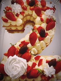 High angle view of strawberries on cake