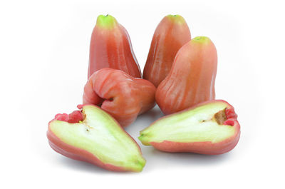 Close-up of fruits against white background