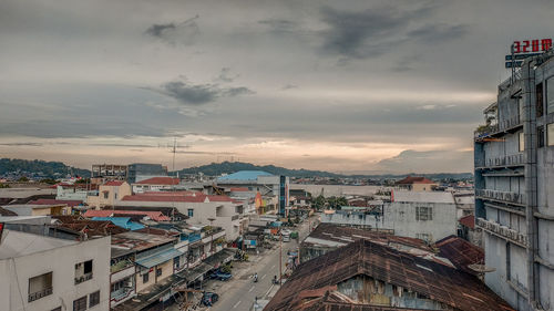 High angle view of buildings against sky during sunset