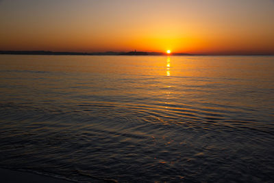 Scenic view of sea against sky during sunset