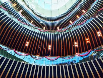 Low angle view of illuminated ceiling