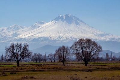 Scenic view of snowcapped mountains against sky