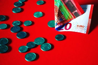 High angle view of currencies on table