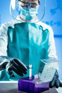 Female scientist experimenting in laboratory