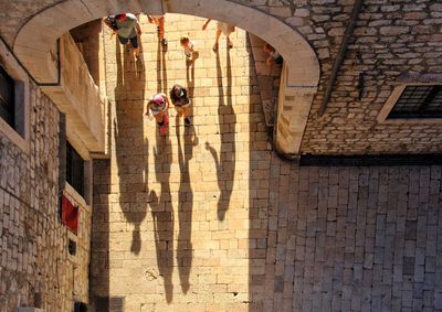 High angle view of people walking in building